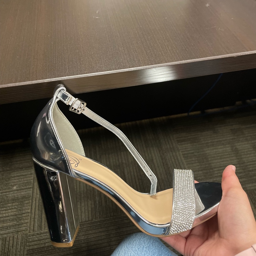 Brand new silver heels size 7. Bought from Windsor never worn